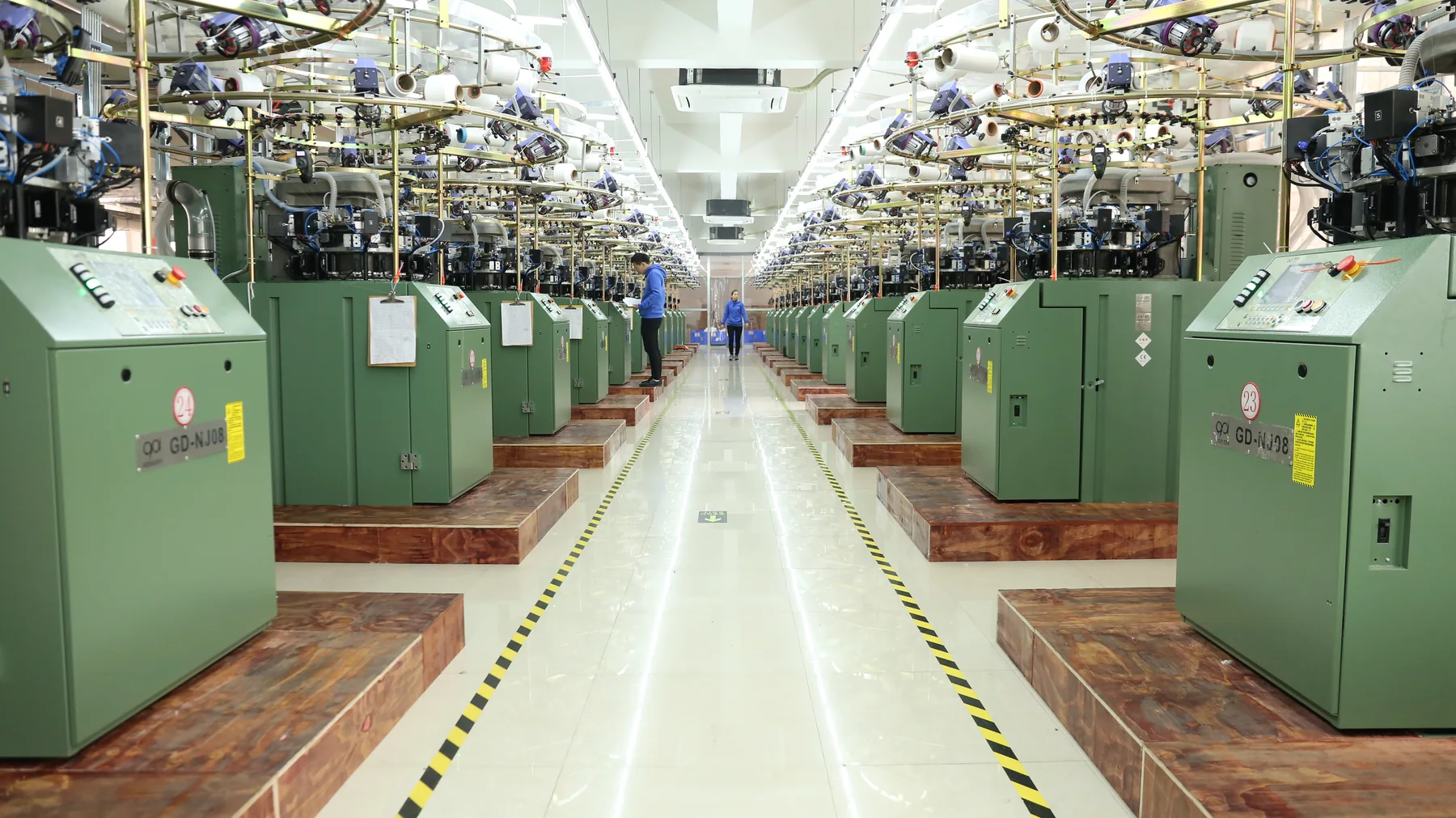 Seamless knitting equipment inside the YB Shapewear manufacturing facility
